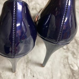 Purple and dark blue heels. I wore it once.
